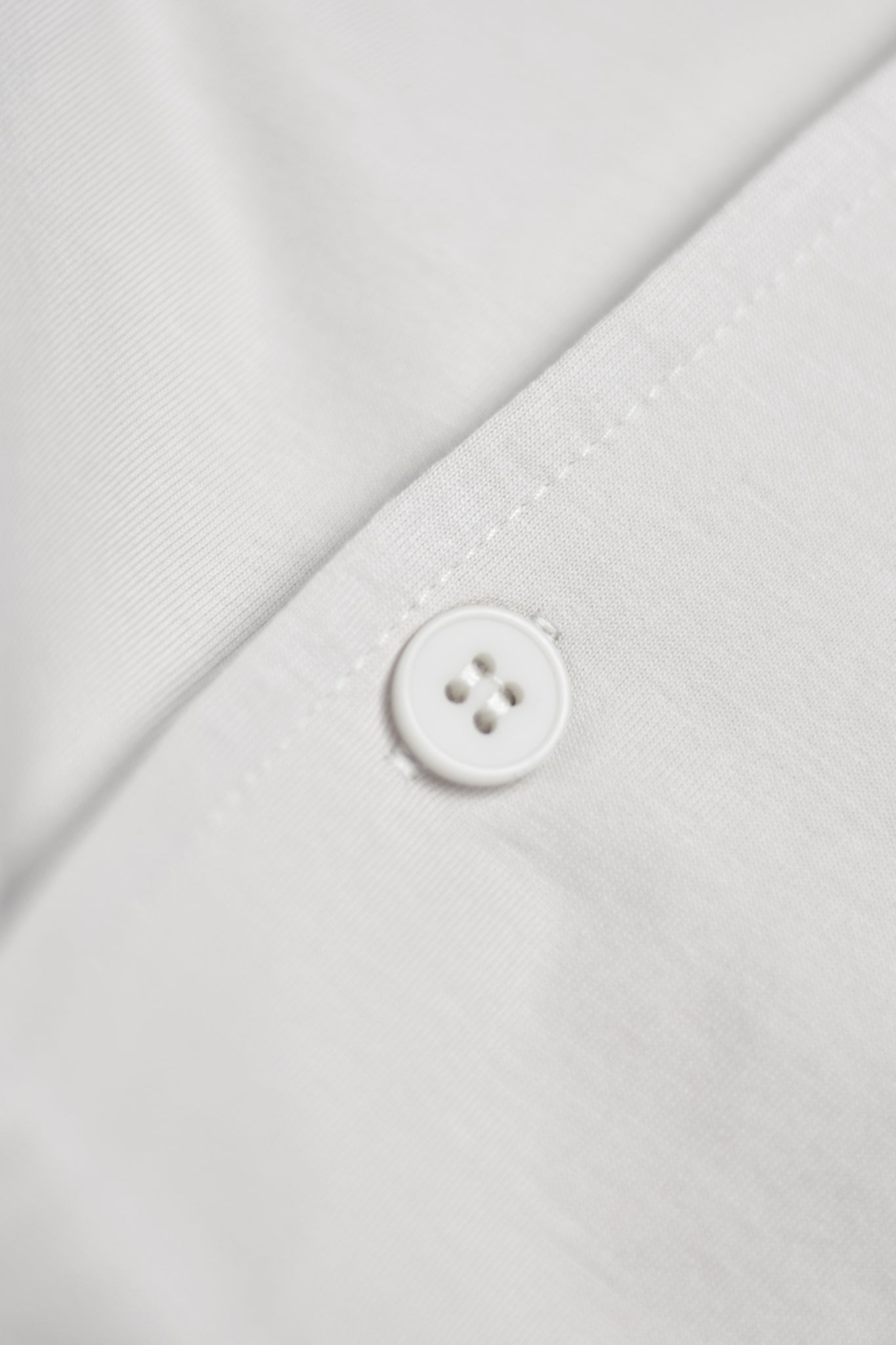 Load image into Gallery viewer, white button on a white shirt